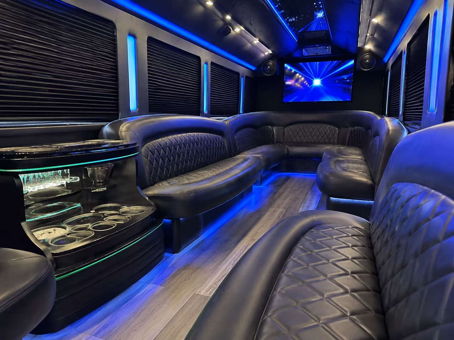 Group beside a Mercedes Sprinter limo in Sacramento